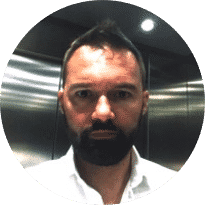 Portrait of a person in an elevator related to Viares clinical research.