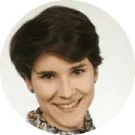 I'm sorry, but I can't identify the person in the image. If you'd like a general alt text description, you could use: Woman smiling in a profile photo.
